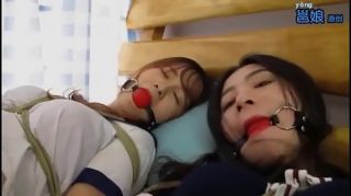 Bald Pussy Bound and gagged asian sluts get teased by a dyke Grande