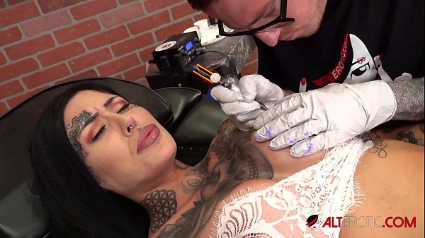 Beautiful babe Janey Doe has her big boob tattooed - 2